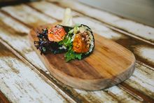 Modern sushi rolls at Doma Cafe, Federal.