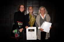 Carolina Schattauer Ramnö, Communications Manager Food Travel at Visit Sweden presents David and Marie Naraine, Swedish Country Living with their award