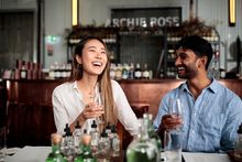 Couple enjoying a gin masterclass experience at Archie Rose Distilling Co., Rosebery.