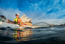 Woman kayaking on Sydney Harbour.