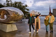 Friends arriving outside the Museum of Contemporary Art Australia in The Rocks, Sydney...Artwork: Moon in a Dew Drop.Artist: Lindy Lee.
