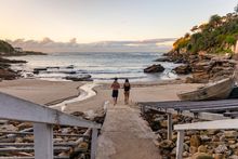 Couple enjoying a morning visit to Gordons Bay, Coogee.