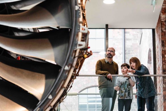 A family admire the Rolls-Royce Trent 1000 Engine at the Derby Museum of Making 
