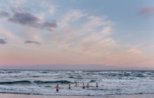 Winter bathers going into the water on a winter morning on Klitmoeller Beach in Thy, North Jutland. 