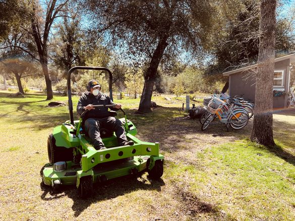 The electric lawn mower at Sierra Meadows cuts grass and emissions..  