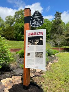 Dunbar Cave's TN Music Pathways marker stands outside the state park's visitor center.