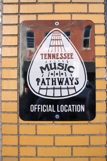 The Roxy Regional Theatre TN Music Pathways marker is mounted to the building at 100 Franklin St. in Clarksville.