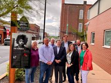 City, state and local tourism leaders gather by the Jimi Hendrix TN Music Pathways marker in Clarksville, Tenn.