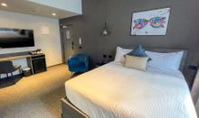 The interior of Microtel by Wyndham Wellington Central’s Business Queen room