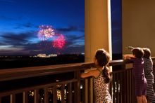 Visitors to Orlando can catch a fireworks display every night of the year. Here, guests of the Four Seasons Resort Orlando at Walt Disney Resort enjoy Disney's fireworks from their balcony.