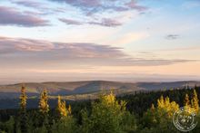 Ester Dome, located just outside of Fairbanks, Alaska at 11:27 pm. 