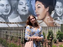 Chloe Gutierrez, a Gardner family member, poses in front of the first “outdoor exhibit” for the Ava Gardner Museum, a project which is attracting a lot of interest for the upcoming festival, and providing a beautiful selfie location in Downtown Smithfield