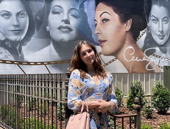 Chloe Gutierrez, a Gardner family member, poses in front of the first “outdoor exhibit” for the Ava Gardner Museum, a project which is attracting a lot of interest for the upcoming festival, and providing a beautiful selfie location in Downtown Smithfield Chloe Gutierrez, a Gardner family member, poses in front of the first “outdoor exhibit” for the Ava Gardner Museum, a project which is attracting a lot of interest for the upcoming festival, and providing a beautiful selfie location in Downtown Smithfield