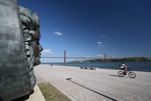 Cyclist by the Tagus riverside