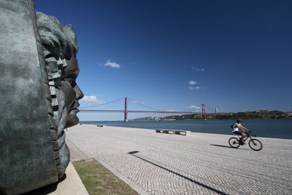 Cyclist by the Tagus riverside
