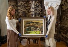 Zuleika Gallery's founder director Lizzie Collins left and Blenheim Palace's Kate Ballenger with Mill Cottage, Treyford, 1962 by Paul Maze
