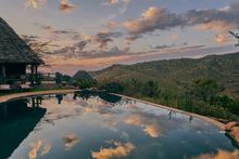Infinity pool overlooking waterhole, Borana Lodge, Kenya