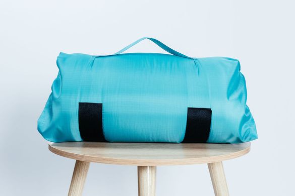 Easily travel with a pillow in the Jade SleepKeeper Easily travel with a pillow in the Jade SleepKeeper