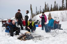 Ice fishing in the Yukon, Canada