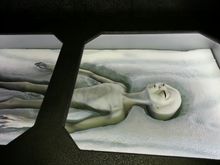 Alien laying down