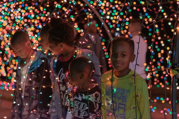 Children enjoy one of the colorful light displays at Christmas on the Cumberland.