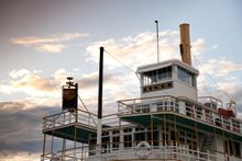 The S.S. Keno paddlewheeler sits under the midnight sun on front street in Dawson City