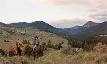 Couple riding, O.T.O. Ranch, Montana