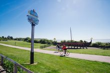 Viking Ship 'Hugin' and cyclists
