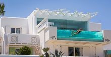 Dive Into Spring at the Only Glass-Front Pool in Mykonos!