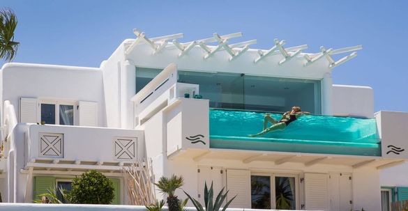 Dive Into Spring at the Only Glass-Front Pool in Mykonos!