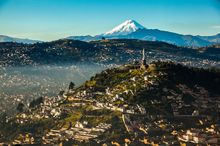 Quito with Cotopaxi Volcano
