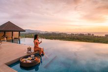 The Pavilions Phuket infinity pool at sunset