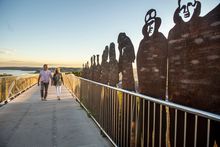 Couple walking along the Newcastle Memorial Walk, The Hill