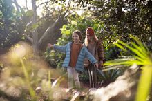 Children enjoying The Ian Potter Children's Wild Play Garden in Centennial Park.