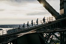 Family enjoying the Burrawa Indigenous Experience at BridgeClimb, Sydney