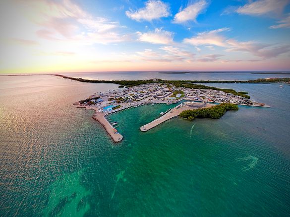 Located on its own island, Encore Fiesta Key RV Resort is a first time Tripadvisor® Travelers’ Choice award winner. Surrounded by incredible ocean views, the resort offers the conveniences of a restaurant, beach bar, swimming pool, hot tubs and marina wit