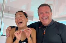 Moved to tears following the rescue of Oceanic Manta Ray from fishing nets.  Dive instructor - Tomoyo Yoshida and General Manager - Mark Eletr, Holiday Inn Resort Kandooma Maldives.