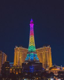 The Eiffel Tower at Paris Las Vegas, illuminated in the Pride Flag colors for National Pride Month.