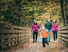 Family enjoys a fall hike at Rotary Park.