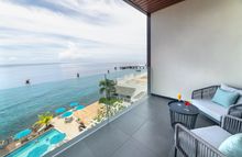 The view from one of the new Fort Ocean View rooms. The balconies overlook the clear Caribbean Sea