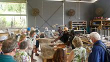 Coral Expeditions guests visiting Yirrkala Art Centre during their Cape York & Arnhem Land expedition