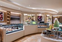 Cannelé's display of freshly baked breads, pastries and cakes