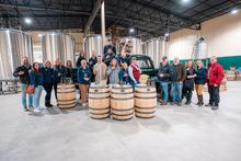 Attendees of the Laurel Highlands Pour Tour 4.0 launch event pose for a photo at Ponfeigh Distillery, Somerset.