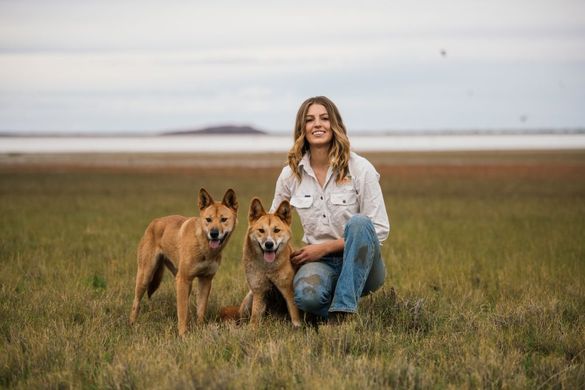 Zali Jestrimski with dingos Eulalia and Steven, Wooleen Station