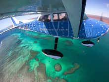 Spotter Plane flying over Ningaloo Reef