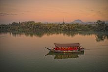 At Azerai La Residence, Hue, experience-seeking couples can embark on private sunset cruises along the Perfume River