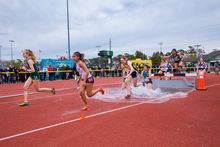 College and high school athletes participate in an invitational track and field meet held in Myrtle Beach, S.C