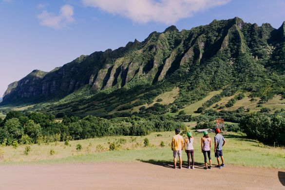 Tour group stopping for a scenic break at Kualoa Ranch.