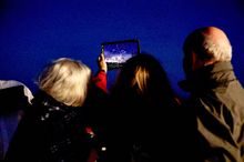 Guests stargazing on board Borealis