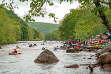 Whitewater enthusiasts participate in the Stonycreek Rendezvous in Pennsylvania's Laurel Highlands region.